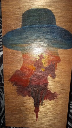 Cowboy double silhouette laser engraved on wood and hand painted